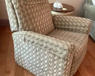 $180 	
#11 LazyBoy Classic recliner green print a stain in lower right back 36Wx33Dx38T	