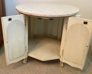 $90 	#44 Round marble top cabinet 24Wx22T painted	