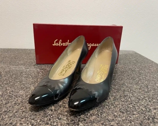 $50 	
#51 Lot Ferregamo Pair of Shoes 		