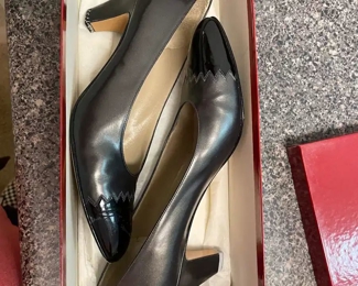 $50 	
#51 Lot Ferregamo Pair of Shoes 		