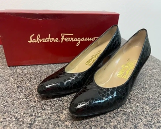$50 	
#51 Lot Ferregamo Pair of Shoes 		