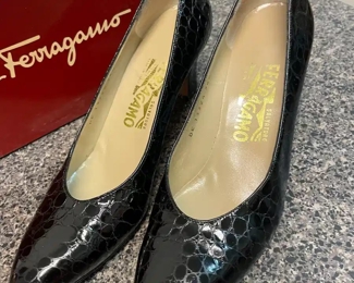 $50 	
#51 Lot Ferregamo Pair of Shoes 		