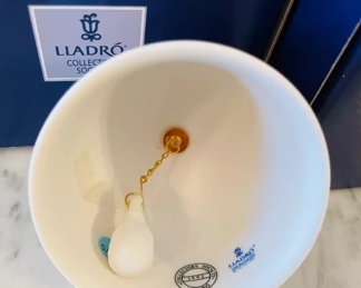 $30 	
#57 Set of 3 Lladro bisque bells with boxes									
	