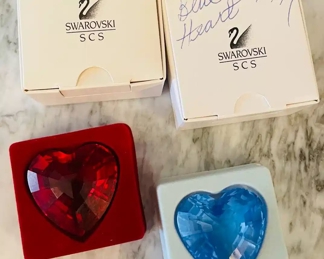 $70 	
#62 Swarovski 2 hearts paperweights with box 		