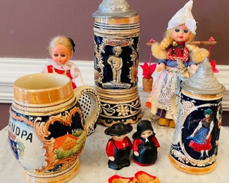 $60 	"
#64 German lot Steins, & dolls 7 pieces "	