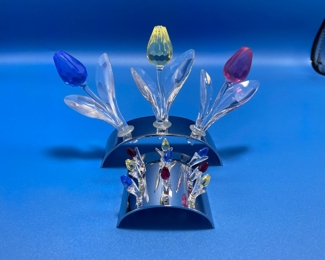 $50 	
#74 Swarovski tulips 2 sets with rodium stand 	