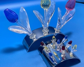 $50 	
#74 Swarovski tulips 2 sets with rodium stand 	