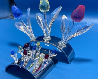 $50 	
#74 Swarovski tulips 2 sets with rodium stand 	