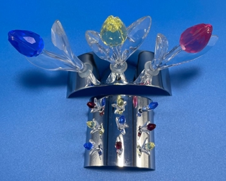 $50 	
#74 Swarovski tulips 2 sets with rodium stand 	