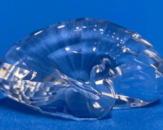 $24 	
#77 Swarovski shell in box	