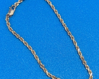 #102 - $78 - 14kt gold rope bracelet 3.14 gr.