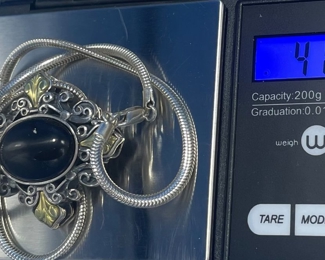 #106 - $75 - Ann King Sterling & 18kt pendant on sterling 19" chain 