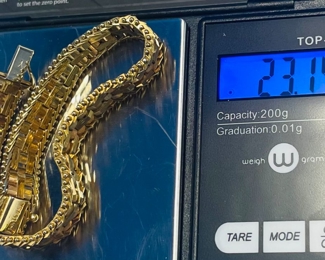 #118 - $575 - 14kt multi color gold flat marked 23.14gr