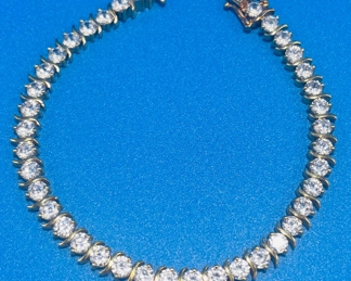 #120 - $170-  14kt gold & CZ bracelet sz 7