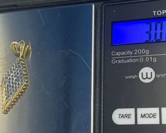 #125 - $94 - 14kt gold pendant triangle marked 3.8gr 11/2"