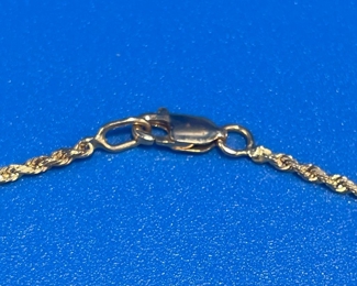 #128 - $180 - 14kt gold rope chain 24"L marked 585 7.25gr