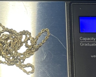 #128 - $180 - 14kt gold rope chain 24"L marked 585 7.25gr