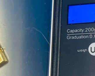 #135 - $80 -14kt gold charm bible opens 1 1/2" 3.19 gr 