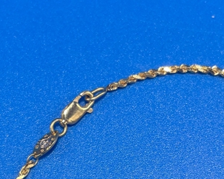 #145 - $136 - 18kt yellow gold / silver balls 4.26gr