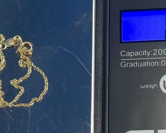 #149 -$20 -14kt gold chain chain 18" 0.68gr