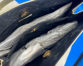 #179 - $50 Paloma picasso gold purse made in italy 