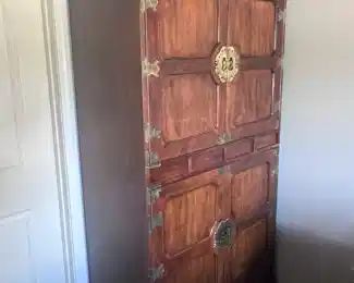 Armoire that belongs to queen bedroom set - all sold separately 