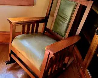 Fine arts and crafts oak rocker with leather upholstery