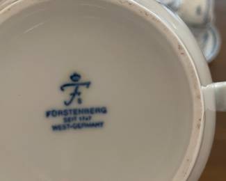 Forstenberg Porcelain Set features coffee and tea pots, cream and sugar, cake/sandwich serving plate, bowl saucers, cups and cake plates.  Set for 18, missing 1 bowl saucer.