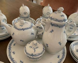 Forstenberg Porcelain Set features coffee and tea pots, cream and sugar, cake/sandwich serving plate, bowl saucers, cups and cake plates.  Set for 18, missing 1 bowl saucer.