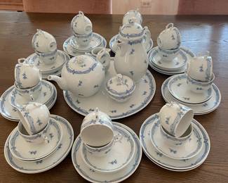 Forstenberg Porcelain Set features coffee and tea pots, cream and sugar, cake/sandwich serving plate, bowl saucers, cups and cake plates.  Set for 18, missing 1 bowl saucer.