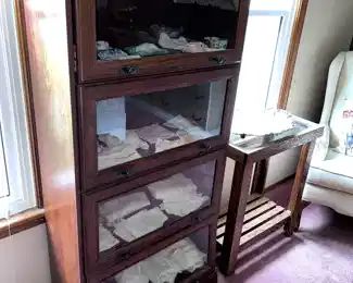 wood and glass bookshelf (some damage on bottom shelf)