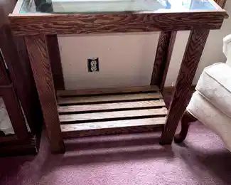 Wood display table with glass top,