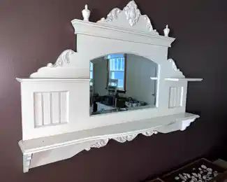 Antique mirror and shelf,