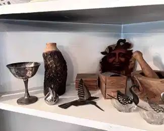 Silver plated swan salt and pepper dishes, wood collectables, silver drinking cup.