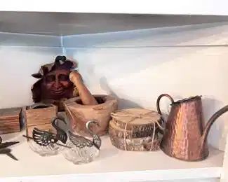 wooden mortar and pestle, wood coasters, copper watering can.