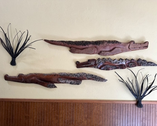 Gators made out of sweet gum trees
The holes are made from birds pecking for bugs