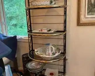 $250 USD Black Gold Bakers Rack Etagere w Curved Front TM193-12 This Bakers Rack offers a stylish and smart storage solution. This traditional baker's rack has four curved glass shelves The shelves offer handy storage and display space for spice jars, bowls, and other kitchen accessories. Also the convenient shelves are perfect for pots, pans, and plants. This baker's rack has a black and gold accent finish for a sleek appearance. Scrolled metal accents add to the overall charm.
Dimensions: 28 x 20 x 72"H
Condition: Very good condition
Local pick up Sterling, VA. Contact us for shipper suggestions. https://goodbyhello.com/products/etagere-tm193-12?_pos=16&_sid=6bfff0fb0&_ss=r