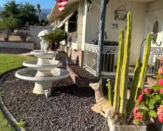 Water fountain. Deer Statue. Flag.