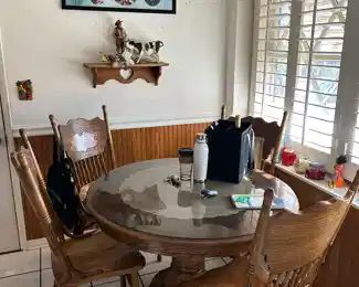 Round wooden dining table