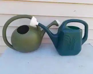 (2) watering jugs