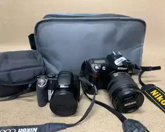 Nikon D70 Digital Camera With Quantaray 67mm DMC-UV Nikon Coolpix P80 Digital Camera With Cases
