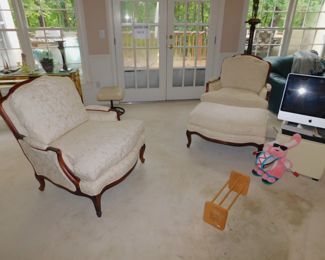 A Pair Of French Bergere Chairs And Ottoman