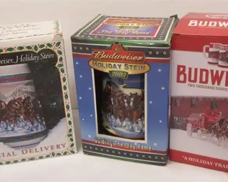 THREE BUDWEISER HOLIDAY STEINS: 1993 SPECIAL DELIVERY, 2002 GUIDING THE WAY HOME, 2018 HOLIDAY STEIN