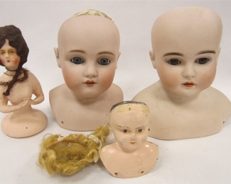ANTIQUE DOLL HEADS: TWO GERMAN ONE WITH SLEEPY EYES. ONE GERMAN TIN. ONE GERMAN COMPOSITION BOUDOIR