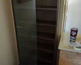 Cabinet with lock for glass doors and bottom drawer