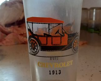 Two cars on each glass. 5 glasses available.  Red, blue and green