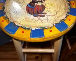 One of 10 hand painted stools