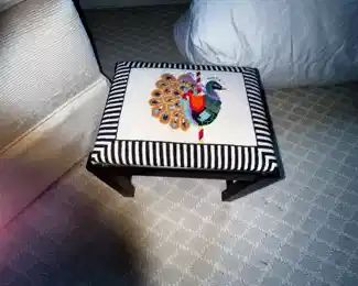 Small needlepoint footstool