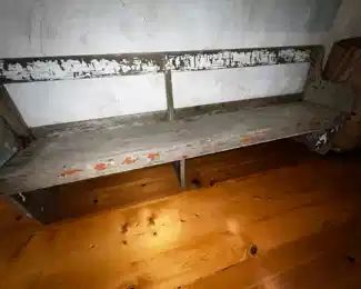 Really long weathered bench