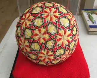 Beautiful needlepoint "ball" in case